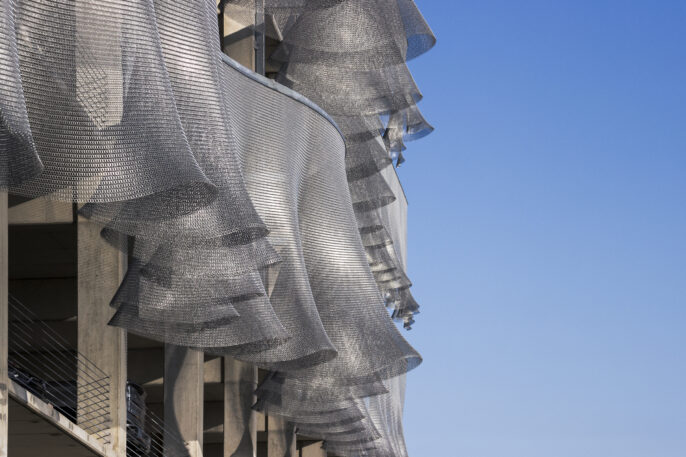Chainmail in Facade of a Built Space for Parking Cars