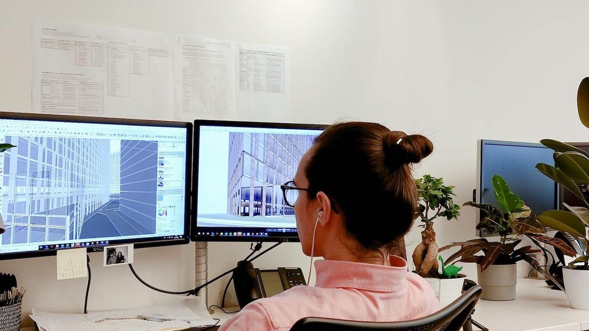 Architecture intern organizing drawing files on BIM/Cloud system.