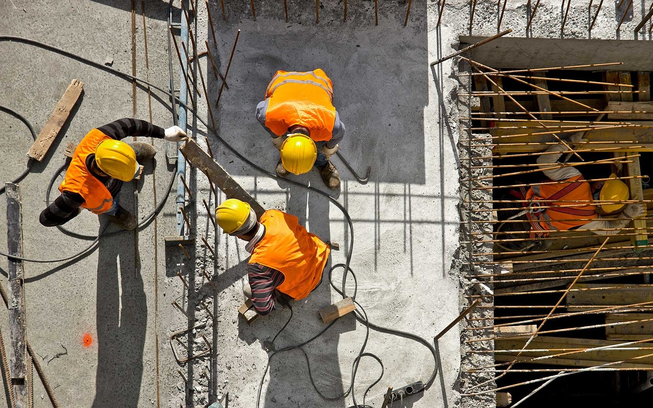Site Engineer supervising Construction work on site