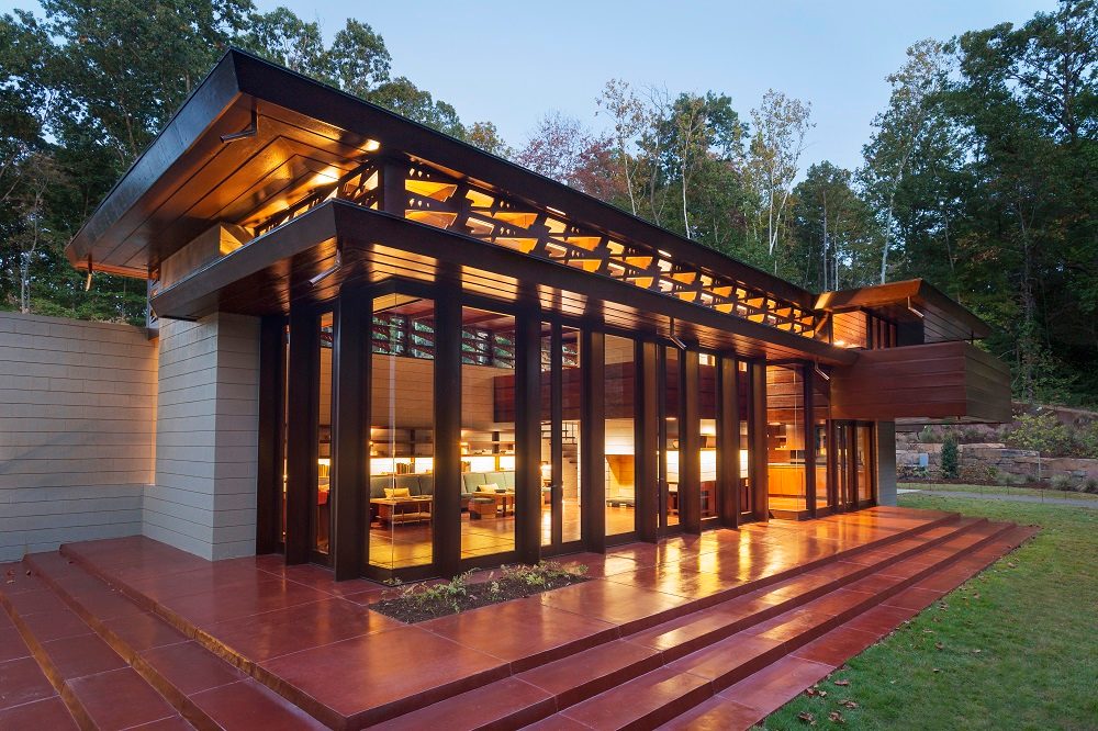 Interior view showcasing the open plan and wooden finishes in Bachman-Wilson House.