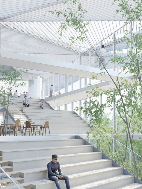A spacious, modern indoor area features large windows, letting in abundant natural light.&nbsp;