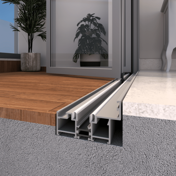 Flush door threshold detail between interior and exterior spaces.*