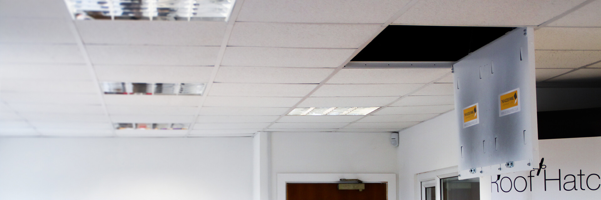 Ceiling detail showing concealed MEP services with access panels.*