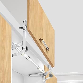 Pivot hinge used in tall kitchen pantry cabinet.*