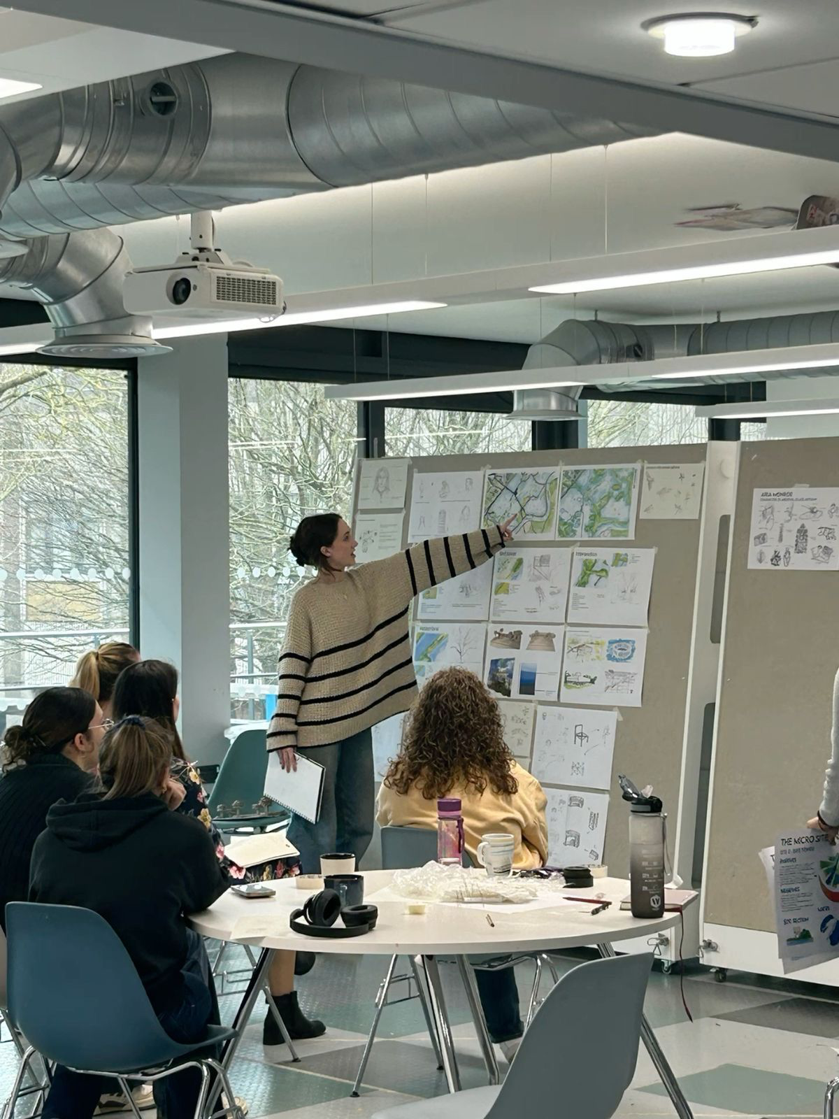 Architect discussing project brief and scope planning before design phase.*