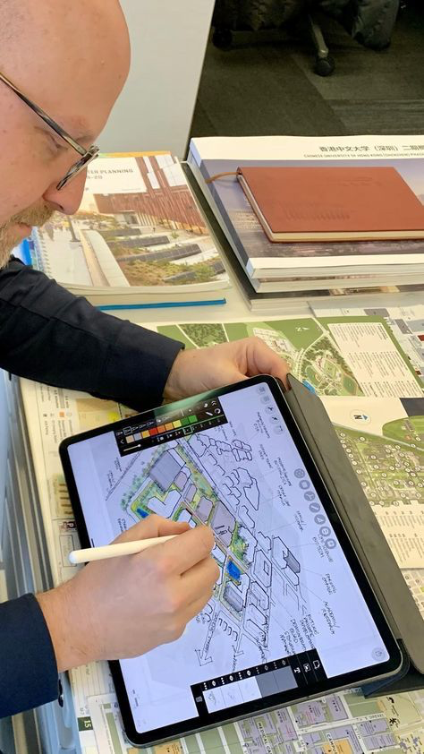 Architect using digital tools for efficient project planning.