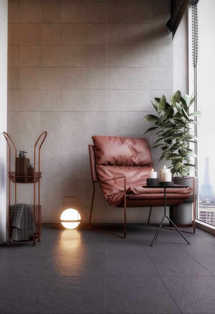 A modern interior rendering showcases a brown leather chair, a side table with lit candles, and a potted plant. 