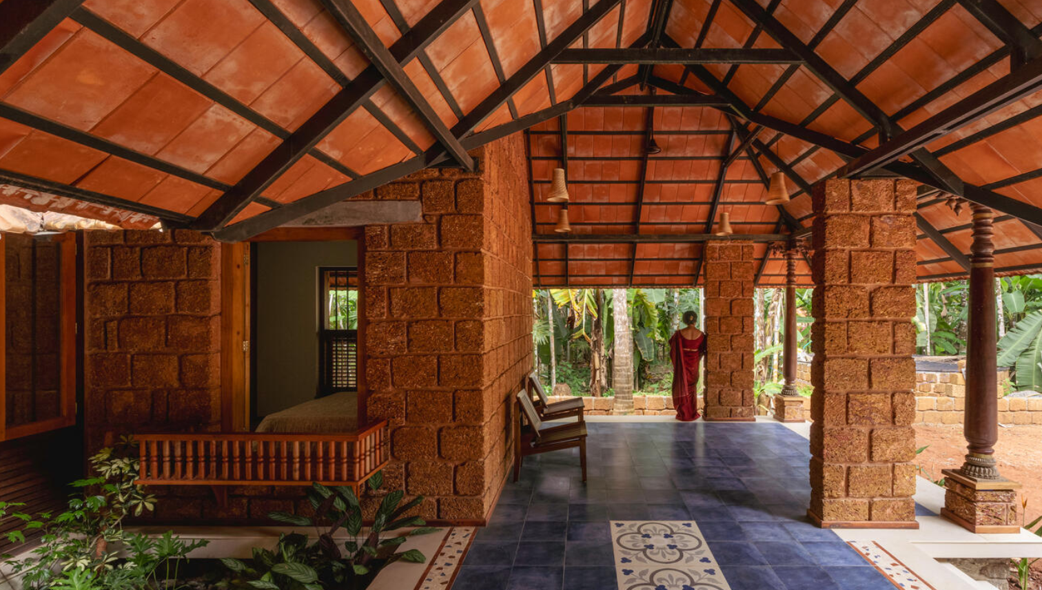 House with a grounding, raw earthen aesthetic and material pallete