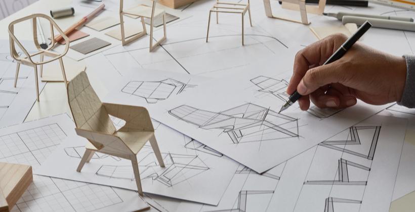 Industrial designer sketching and prototyping a product model.*