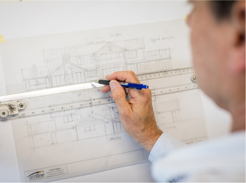 Professional on Drafting Board, drawing Facade Details 